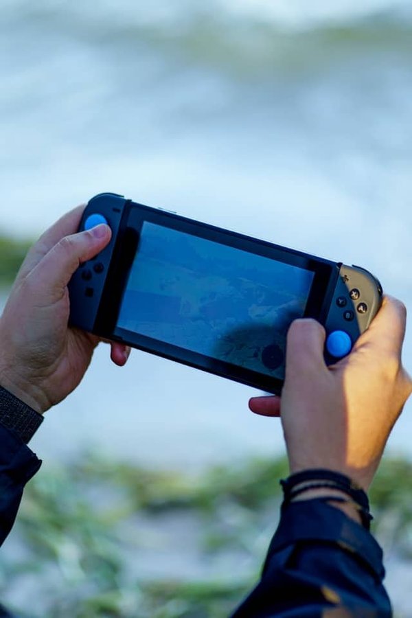 How can neural networks be used to create adaptive enemy AI in tactical shooter games?